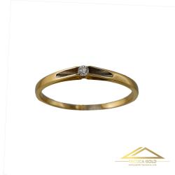 Złoty pierścionek z brylantem o masie 0,04 ct oraz wadze 1,20g
